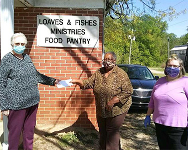 Modern Woodmen members in Warrenton, North Carolina donated $1,000 to help a community food pantry