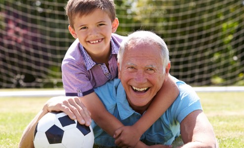 Grandfather and a grandson are having fun time together.
