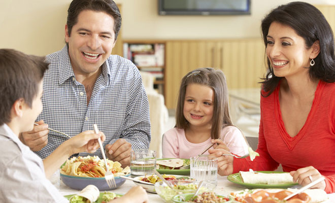 Family eating dinner together